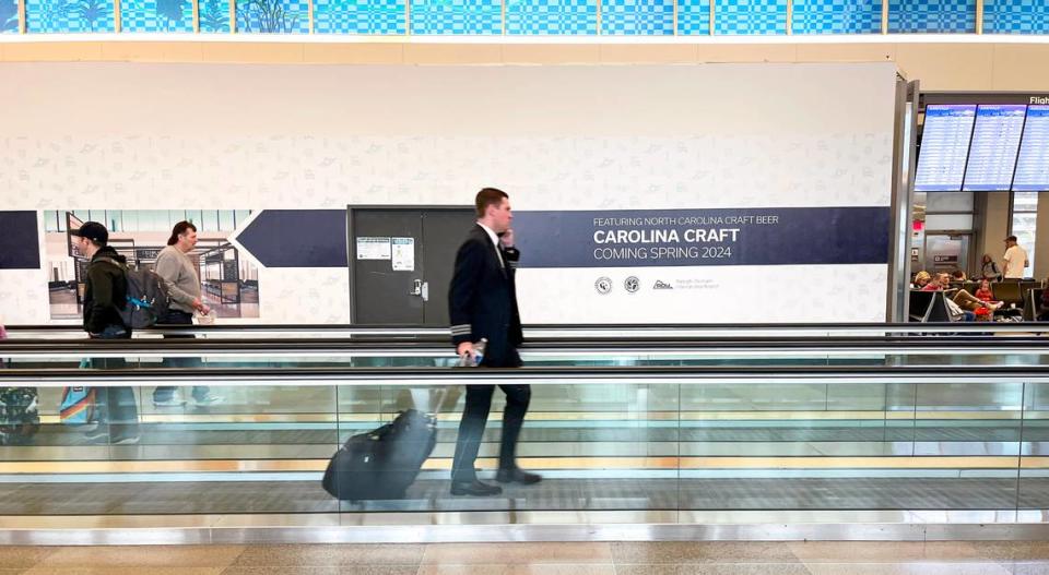 An ad for Carolina Craft is seen inTerminal 2 of Raleigh-Durham International Airport on March 27, 2024.