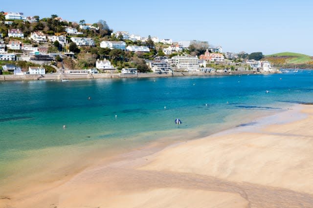 Overlooking the beach at Mill Bay on the Salcombe Estuary, Devon England UK