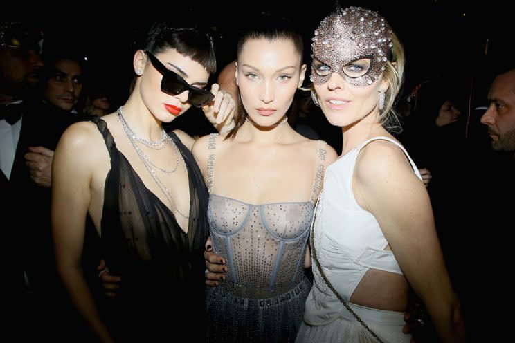 Kendall Jenner, Bella Hadid, and Eva Herzigova at the Christian Dior Bal Masque on Jan. 23, 2017, during Paris Fashion Week. (Photo: Victor Boyko/Getty Images for Dior)