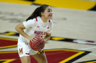 Maryland guard Katie Benzan works the floor against Iowa during the second half of an NCAA college basketball game, Tuesday, Feb. 23, 2021, in College Park, Md. Maryland won 111-93. (AP Photo/Julio Cortez)