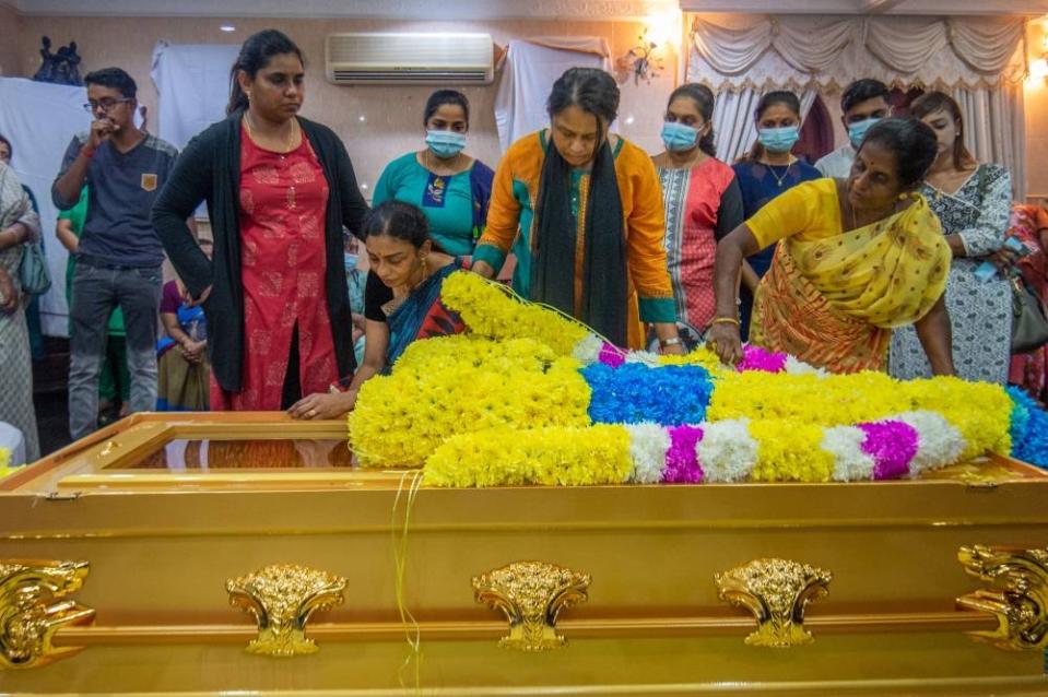 Family and relatives paying their final respects to the late M. Karupaiya in Padang Serai November 17, 2022. — Picture by Shafwan Zaidon