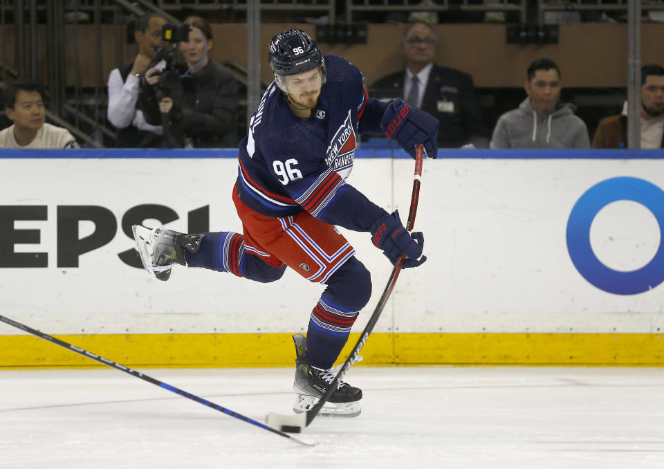 New York Rangers center Jack Roslovic shoots during the first period of an NHL hockey game against the St. Louis Blues, Saturday, March 9, 2024, in New York. (AP Photo/John Munson)