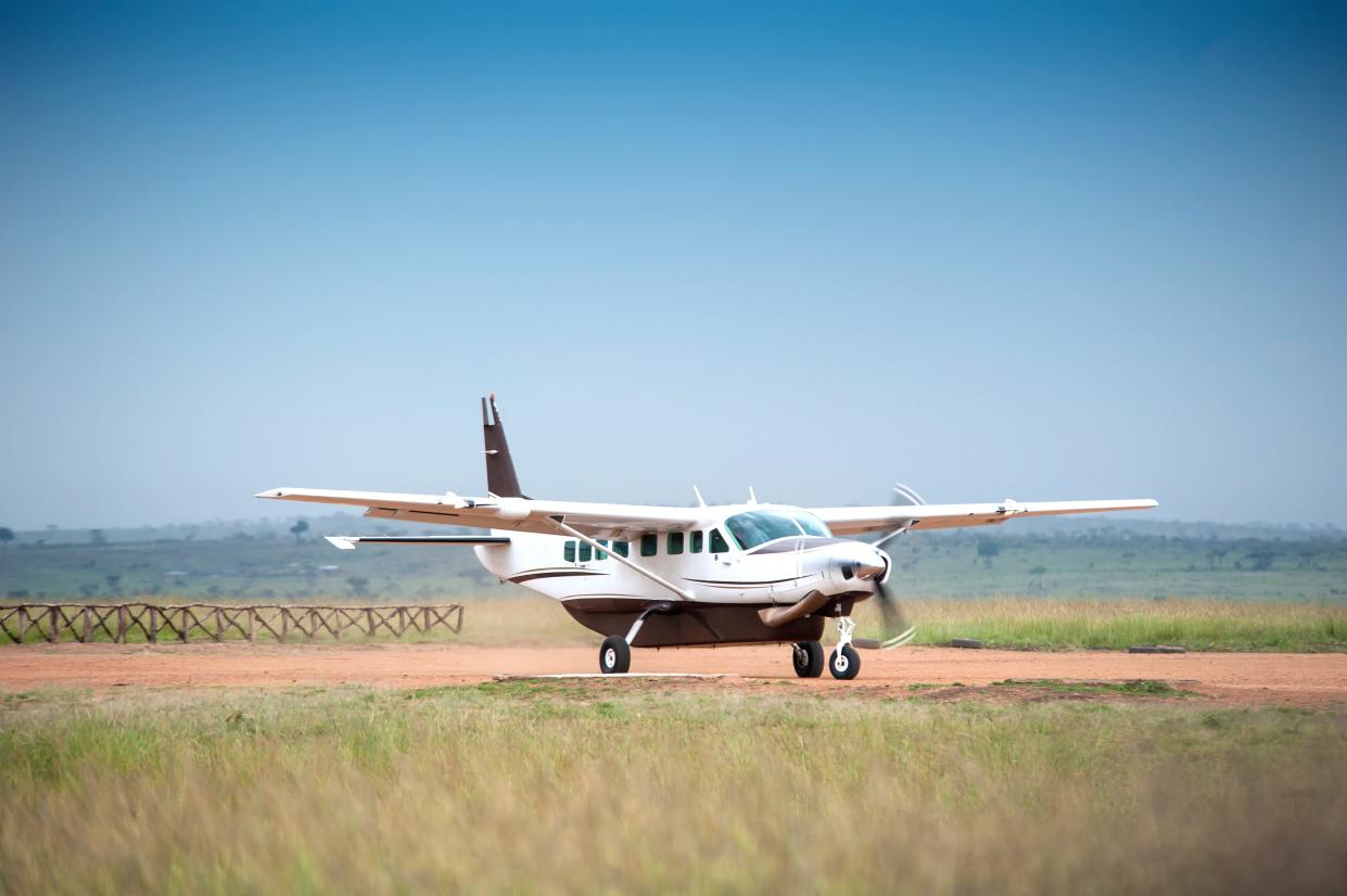 A small plane on a runway.