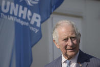 FILE - Britain's Prince Charles arrives at a center for refugees fleeing the war in neighboring Ukraine, inside the Romexpo convention center, in Bucharest, Romania, May 25, 2022. Citing unnamed sources, The Times newspaper reported late Friday June 10, 2022 that Prince Charles has criticized the government's plan to start deporting some asylum-seekers to Rwanda, calling it “appalling." (AP Photo/Vadim Ghirda, File)