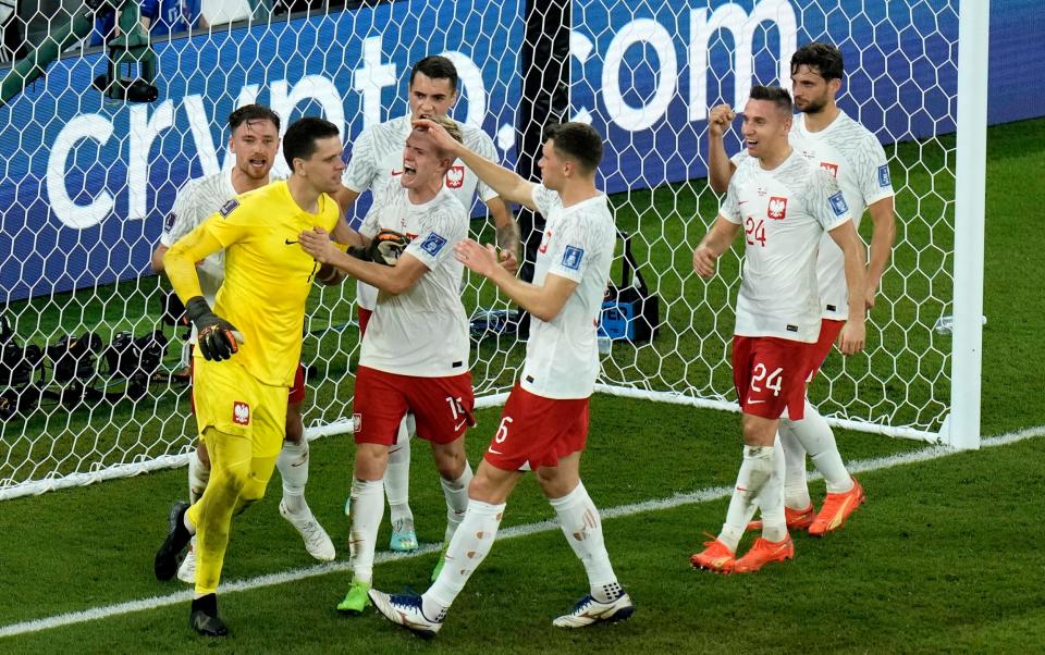 Wojciech Szczesny has been an integral part of Poland's progression from the group stage in Qatar - Hassan Ammar/AP