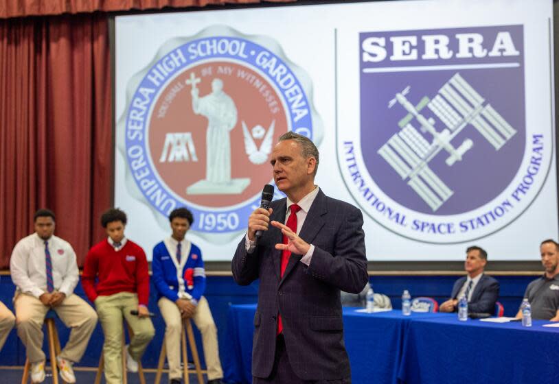 Gardena, CA - April 19: Dr. John Moran, President of Junipero Serra High School, introduces the Junipero Serra High School Space Team, shown at left, who participated in The International Space Station Program (ISSP). They are celebrated during a pep rally and being recognized overall for its achievements in Applied Math, Science and Engineering. The space science team launched an experiment aboard the SpaceX Falcon 9 CRS-30 Rocket to the International Space Station from the Kennedy Space Center in Florida. Junipero Serra High School is one of only nine high schools in the United States to achieve this. The Serra students are being lauded on the Senate Floor by Sen. Steven Bradford (D-Gardena) and the school is being recognized overall for its achievements in Applied Math, Science and Engineering. Photo taken in Junipero Serra High School in Gardena Friday, April 19, 2024. (Allen J. Schaben / Los Angeles Times)