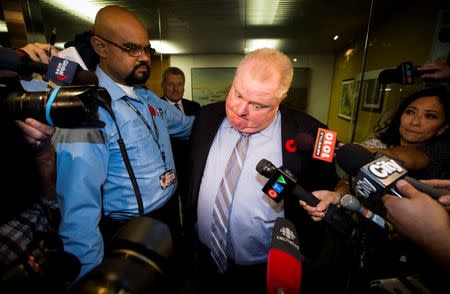 Toronto Mayor Rob Ford reacts to a video released of him by local media at City Hall in Toronto, November 7, 2013. REUTERS/Mark Blinch