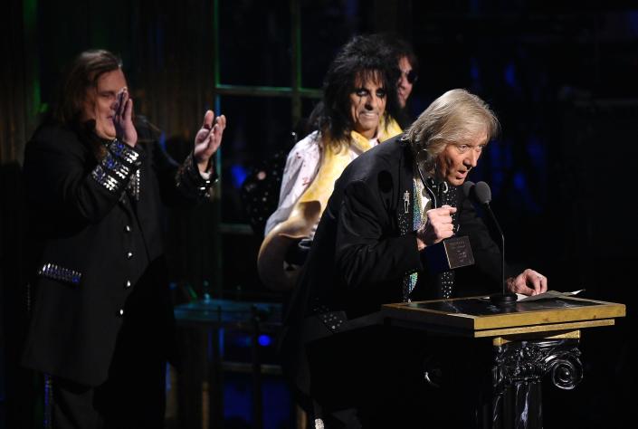 Inductees Michael Bruce, Alice Cooper, Dennis Dunaway and Neal Smith of Alice Cooper Band pose with a snake and accept their award onstage at the 26th annual Rock and Roll Hall of Fame Induction Ceremony at The Waldorf-Astoria on March 14, 2011 in New York City.