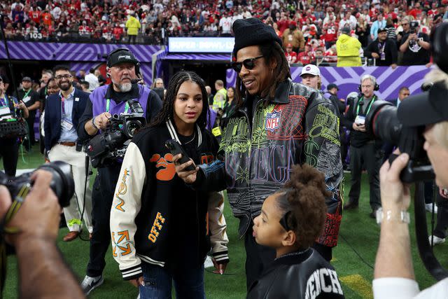 <p>Ezra Shaw/Getty</p> Blue Ivy, JAY-Z and Rumi Carter on the Super Bowl field Feb. 11, 2024.