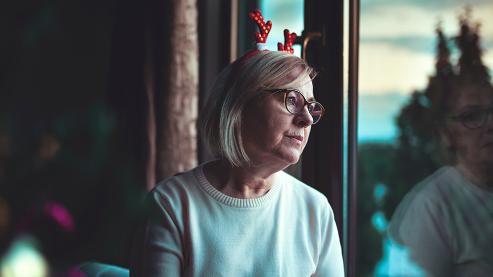 Woman sad Christmas loss loved one advice