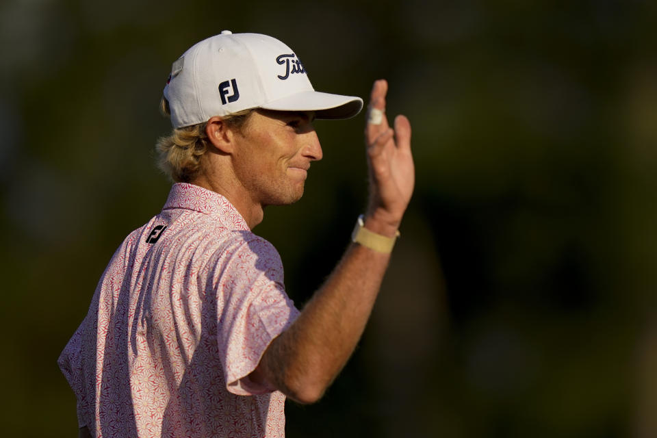 Will Zalatoris waves after putting on the 18th hole during the final round of the Masters golf tournament on Sunday, April 11, 2021, in Augusta, Ga. (AP Photo/Matt Slocum)