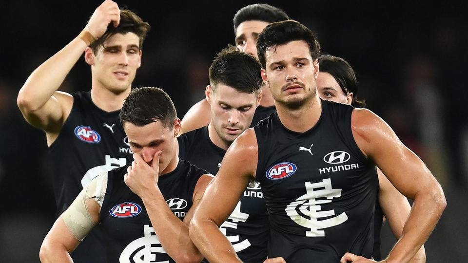Carlton players react after losing to St Kilda.
