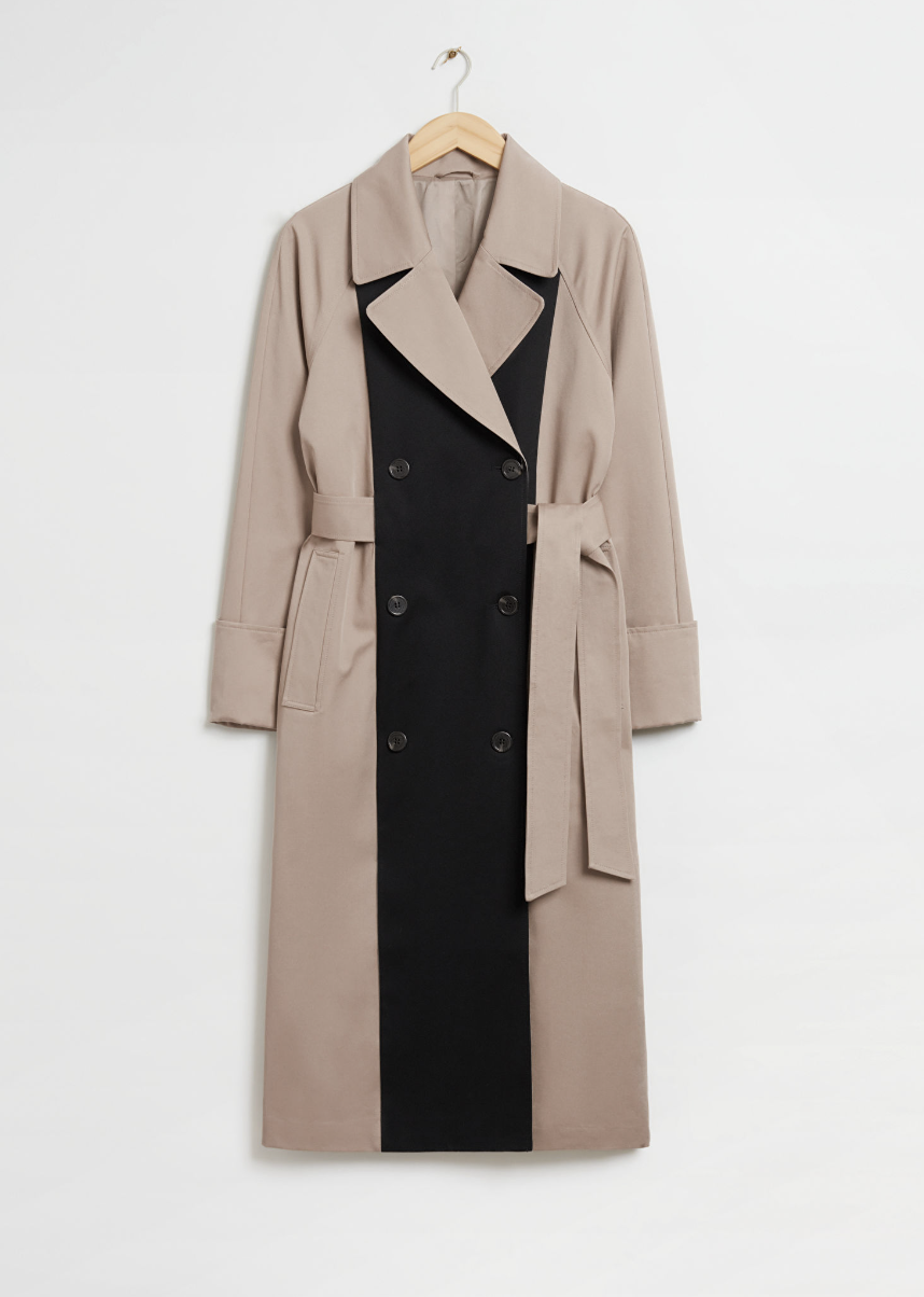 Relaxed Double-Breasted Trench Coat in black and beige (photo via & Other Stories)