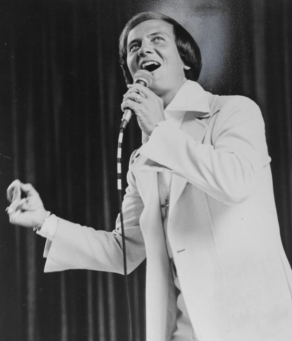 Pat Boone sings in August 1973 at the Cathedral of Tomorrow during a celebration of the ministry of the Rev. Rex Humbard.