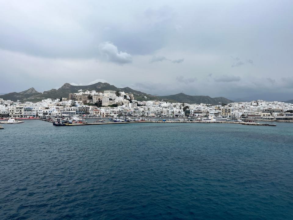 coast of naxos, greece, from the deck of a ferry on the water
