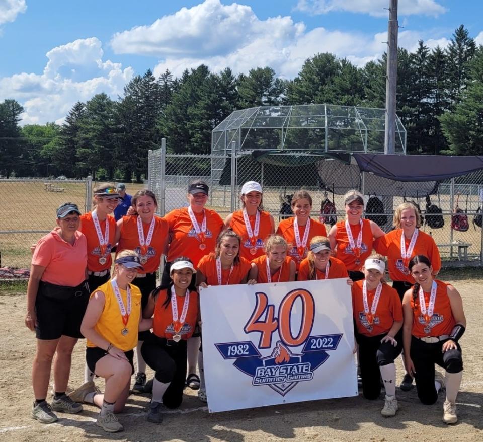 Players and coaches from the Central all-stars celebrate winning a silver medal in the Bay State Games.