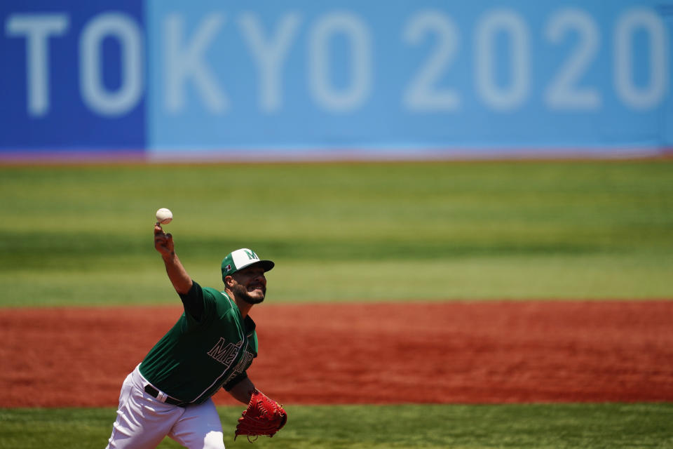 Mexico's Manuel Barrera pitches during a baseball game against Israel at Yokohama Baseball Stadium during the 2020 Summer Olympics, Sunday, Aug. 1, 2021, in Yokohama, Japan. (AP Photo/Matt Slocum)