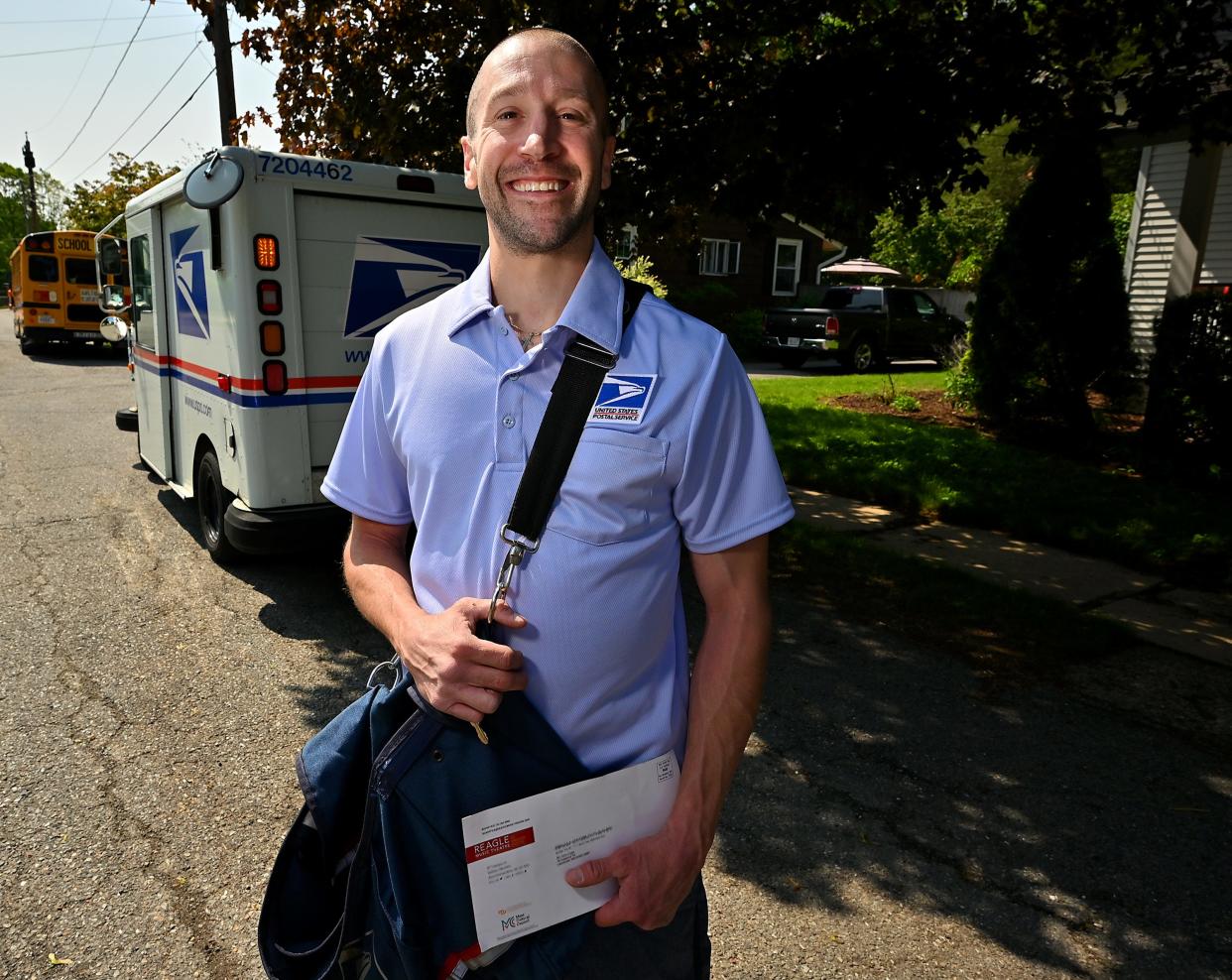 Michael Ciccone, a Leominster mail carrier, was honored this month in Washington, D.C., for helping save a family from a fire in 2019.