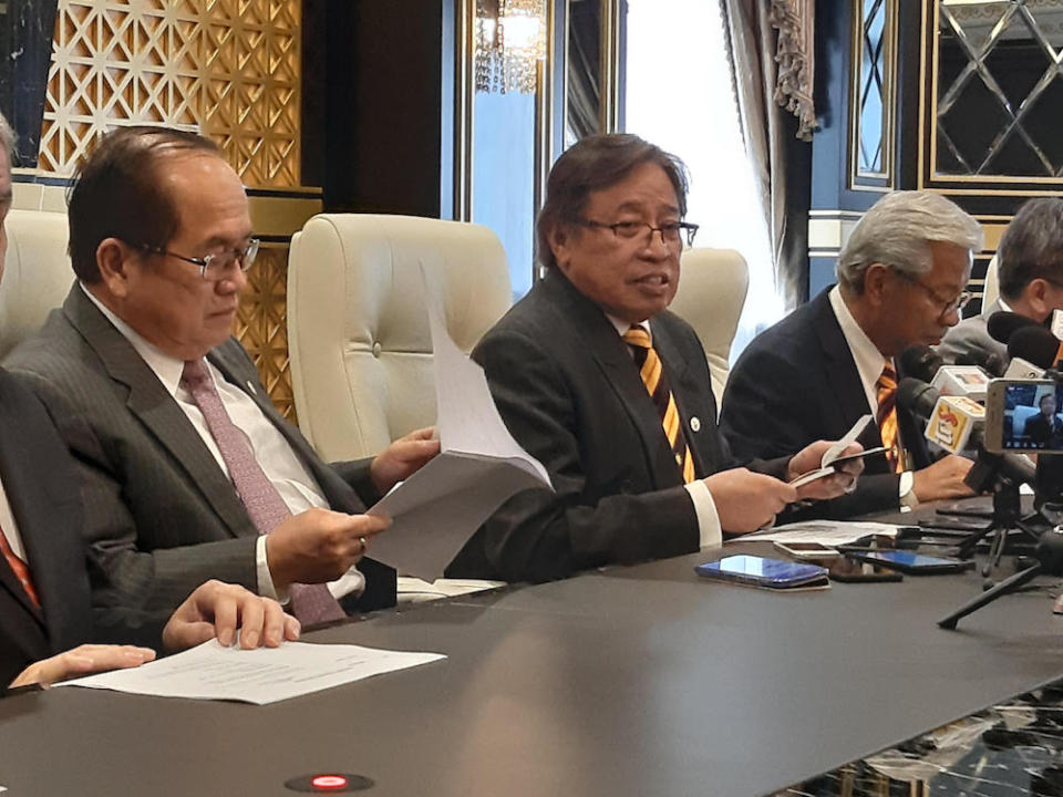 Chief Minister Datuk Patinggi Abang Johari Openg (centre) speaks to reporters after chairing a state Cabinet meeting in Kuching August 22, 2019. — Picture by Sulok Tawie