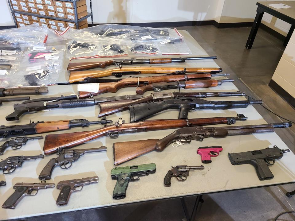 Columbus police on Tuesday displayed some of the approximately 1,500 guns seized in 2022.