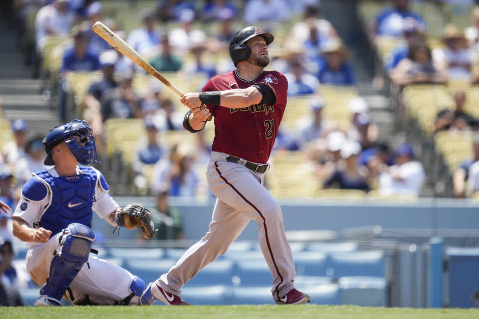 Arizona Diamondbacks' Stephen Vogt (21) hits a home run during the fourth inning of a baseball game against the Los Angeles Dodgers Sunday, July 11, 2021, in Los Angeles. (AP Photo/Ashley Landis)