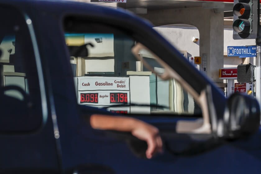 Azusa, CA, Tuesday, March 22, 2022 - Drivers past an Azusa Shell station that is charging $6.09 per gallon for regular gas. (Robert Gauthier/Los Angeles Times)