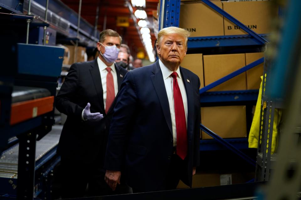 President Donald Trump participates in a tour of Owens & Minor Inc., a medical supply company, Thursday, May 14, 2020, in Allentown, Pa.