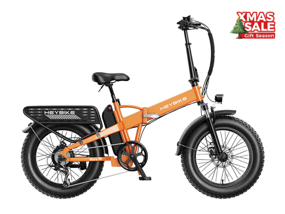 <p>Heybike</p>Heybike Mars 2.0 – $999<ul><li>Motor: 750W rear-hub motor</li><li>Battery: 600 Wh</li><li>Range: 30-45 miles</li><li>Class 3: Up to 28 mph with throttle assist to 20 mph</li></ul><p>The Heybike Mars 2.0 is a compelling evolution of the popular Mars design, offering an exhilarating and versatile journey of exploration. The standout feature is the upgraded 1200W peak rear hub motor, ensuring swift acceleration even on challenging terrains. App connectivity enhances your riding experience, providing a seamless connection with your adventures. The redesigned rear rack adds practicality, and the more compact folded design makes transportation effortless.</p><p>Powered by a robust 600Wh external removable lithium-ion battery, the Mars 2.0 boasts a 45-mile maximum range on a single charge. The integration of a USB charging port, capable of serving as your phone's power bank, adds a practical touch. With a weight capacity of up to 120 lbs, this e-bike is not only powerful but also versatile.</p><p>The extended size facilitates easy customization with bags, baskets, or passenger seats, and the pegboards on both sides offer convenient storage for essentials. Folding the Mars 2.0 in just 15 seconds makes it incredibly portable, perfect for those always on the go. Overall, the Heybike Mars 2.0 seamlessly combines power, practicality, and portability for an unparalleled riding experience.</p>
