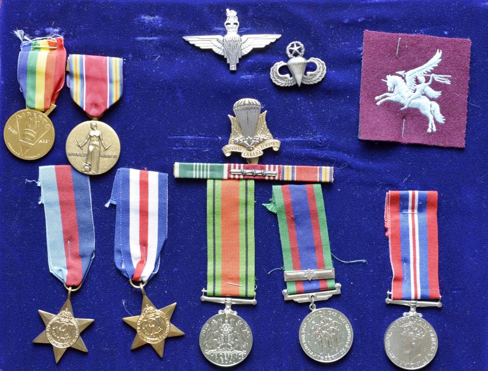 Some of the medals awarded to Dennis Trudeau, Grovetown's former mayor and city councilman, are displayed in this 2018 photo. He is a World War II veteran who participated in the D-Day invasion as a Canadian paratrooper.