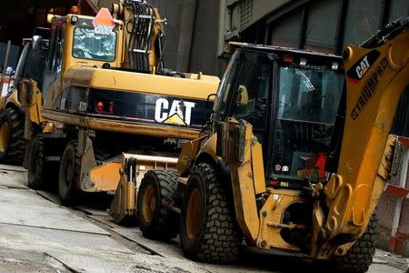 Caterpillar machines are seen at a construction site in New York City, U.S., October 17, 2016. REUTERS/Brendan McDermid