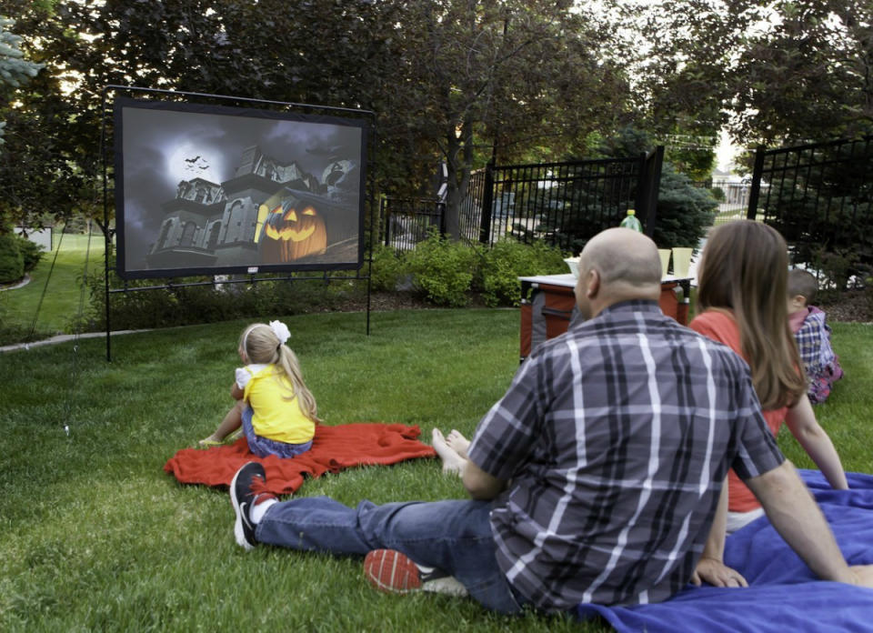 <body> <p>Movie buffs can cue up a fan favorite right from the backyard with the help of a portable movie screen. <a rel="nofollow noopener" href=" http://amzn.to/1OJkNir" target="_blank" data-ylk="slk:Camp Chef's supersize screen;elm:context_link;itc:0;sec:content-canvas" class="link ">Camp Chef's supersize screen</a> is a blockbuster-worthy 92 inches, so the kids won't have to fight for a good view. And because it comes with a projector, carrying bag, and stakes, you'll have everything you need to set up a private screening of a beloved summer classic. <em>Available on <a rel="nofollow noopener" href=" http://amzn.to/1OJkNir" target="_blank" data-ylk="slk:Amazon;elm:context_link;itc:0;sec:content-canvas" class="link ">Amazon</a>; $144.</em> </p> <p><strong>Related: <a rel="nofollow noopener" href=" http://www.bobvila.com/slideshow/11-low-cost-buys-to-boost-a-boring-backyard-49978#.V0NnQ5PyuRs?bv=yahoo" target="_blank" data-ylk="slk:11 Low-Cost Buys to Boost a Boring Backyard;elm:context_link;itc:0;sec:content-canvas" class="link ">11 Low-Cost Buys to Boost a Boring Backyard</a> </strong> </p> </body>