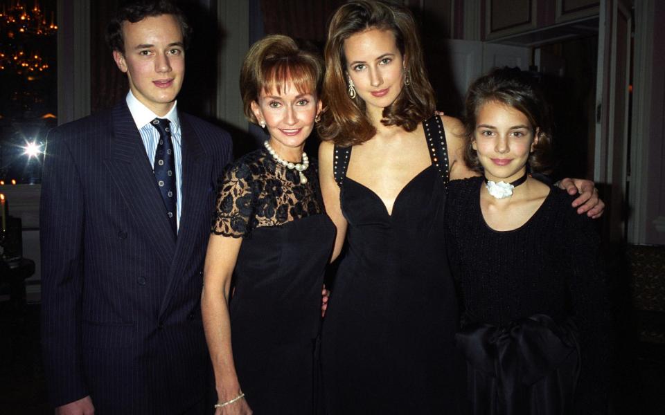 Yvonne Marie Hervey, Dowager Marchioness of Bristol (widow of Victor Hervey, 6th Marquess of Bristol) with her son Frederick (left) and her daughters Victoria (centre right) and Isabella (far right)