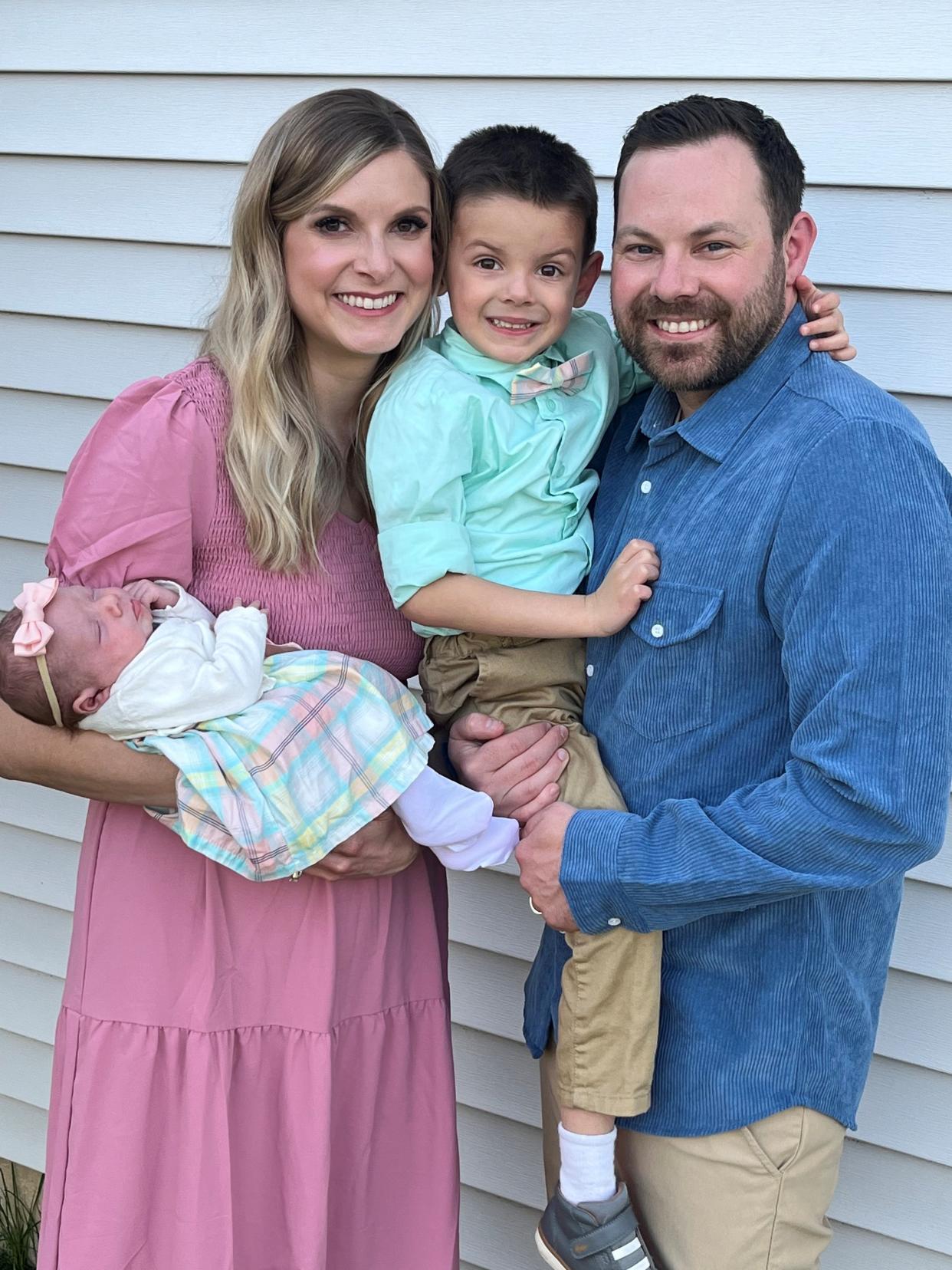 Carolyn and Andrew Clark with their son, Cameron, and daughter, Audrey Marie. Audrey is the first girl born into Clark's family in roughly 100 years.