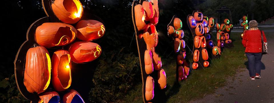 Colorful pumpkin lanterns in all shapes and sizes light up for the Hollowed Harvest walking display at the Marshfield Fairgrounds.