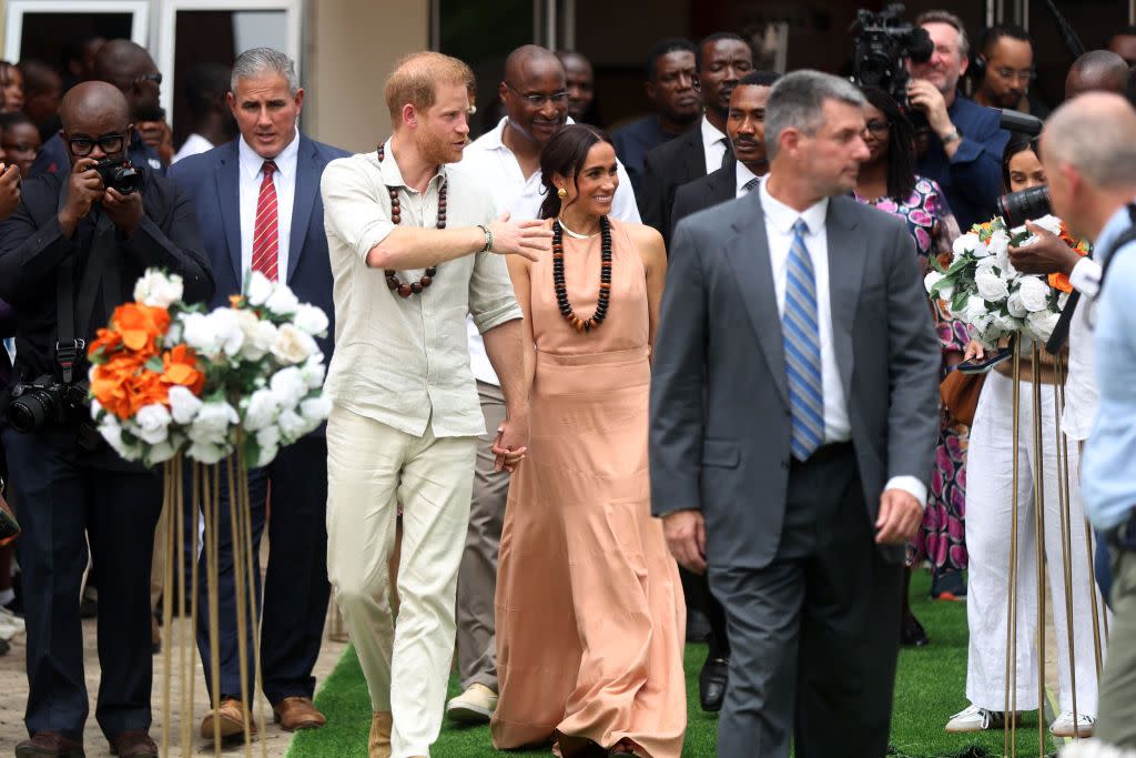britains prince harry, duke of sussex, and britains meghan, duchess of sussex, arrive at the lightway academy in abuja on may 10, 2024 as they visit nigeria as part of celebrations of invictus games anniversary photo by kola sulaimon afp photo by kola sulaimonafp via getty images