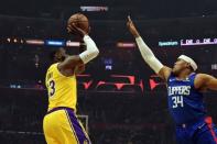 Jan 31, 2019; Los Angeles, CA, USA; Los Angeles Lakers forward LeBron James (23) shoots over Los Angeles Lakers forward LeBron James (23) in the first half at Staples Center. Mandatory Credit: Richard Mackson-USA TODAY Sports