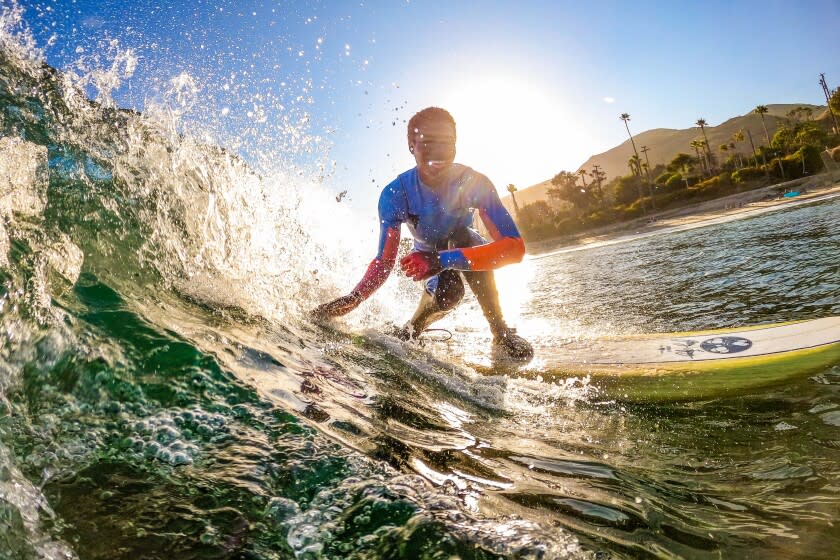 a person surfing.