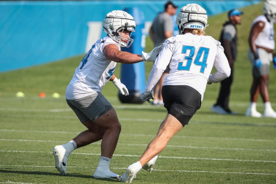 Detroit Lions linebacker Malcolm Rodriguez practices with linebacker Alex Anzalone during training camp at Detroit Lions Headquarters and Training Facility in Allen Park on Monday, July 24, 2023.