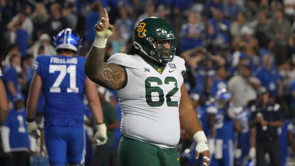 Baylor defensive tackle Siaki Ika celebrates a sack in the first half against BYU on Sept. 10, 2022.