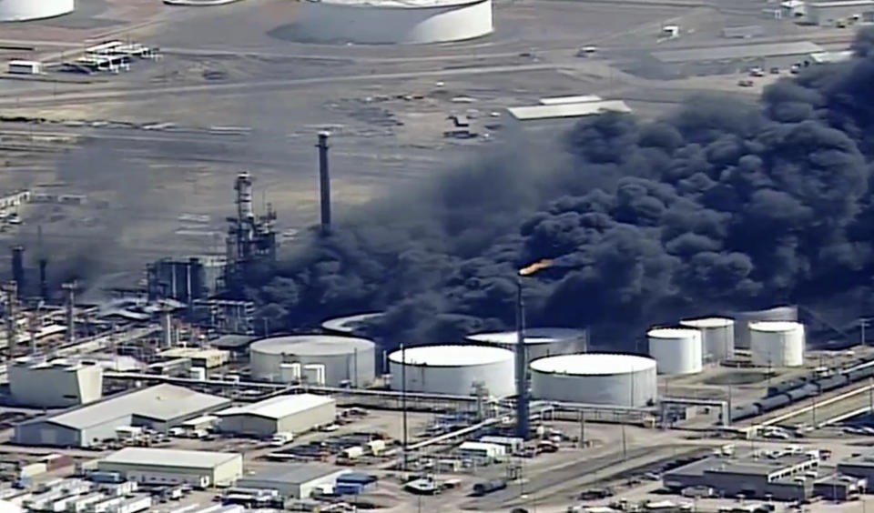 FILE - This aerial image from video provided by KSTP-TV in Minneapolis shows smoke rising from the Husky Energy oil refinery after an explosion, April 26, 2018, at the plant in Superior, Wis. Wisconsin's only oil refinery is on track to be fully operational in June 2023 after a $1.2 billion effort to rebuild the facility five years following an explosion. The 2018 explosion and subsequent fires at the facility then-owned by Calgary-based Husky Energy in Superior injured three dozen workers and fears of a hydrofluoric acid leak caused 2,500 people in the city to evacuate. (KSTP-TV via AP, File)