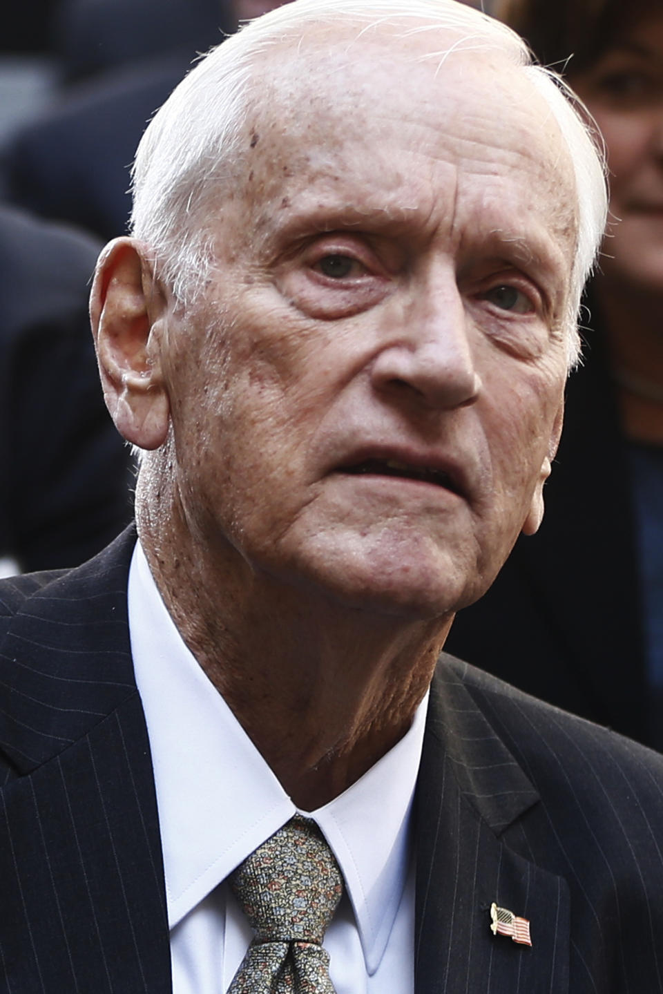 FILE - In this Monday, Oct. 28, 2013, file photo, former FBI Director William Sessions is seated before President Barack Obama and FBI Director James Comey arrive at an installation ceremony at FBI headquarters in Washington. Sessions, a former federal judge appointed by President Ronald Reagan to head the FBI and fired 5 years later by President Bill Clinton, died Friday, June 12, 2020, at his San Antonio home. He was 90. (AP Photo/Charles Dharapak)