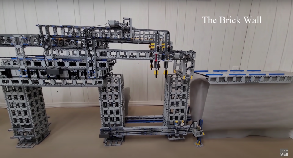 This LEGO bridge-building machine is able to construct bridges up to six feet long, and uses a novel design.