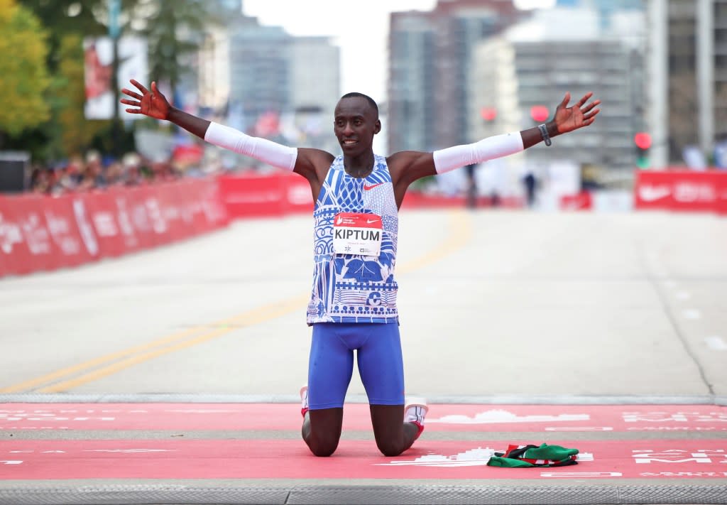 Kelvin Kiptum celebrates his Chicago Marathon world record victory in Chicago’s Grant Park on Sunday, Oct. 8, 2023. Kiptum was killed along with his coach in a car crash in Kenya late Sunday, Feb. 11, 2024. (Eileen T. Meslar /Chicago Tribune via AP)