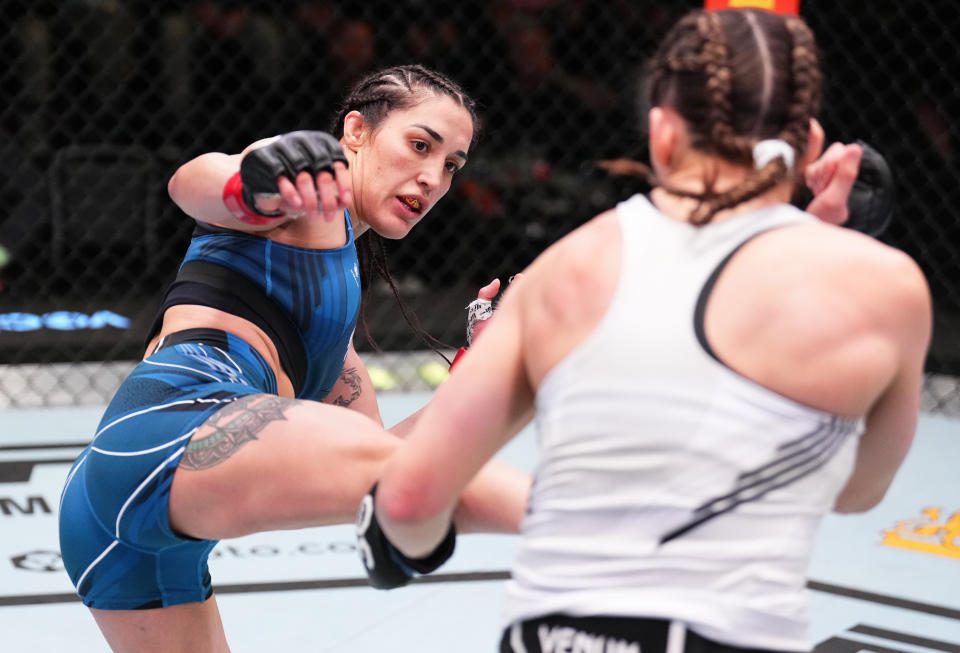 LAS VEGAS, NEVADA – FEBRUARY 25: (L-R) Tatiana Suarez kicks Montana De La Rosa in a flyweight fight during the UFC Fight Night event at UFC APEX on February 25, 2023 in Las Vegas, Nevada. (Photo by Chris Unger/Zuffa LLC via Getty Images)