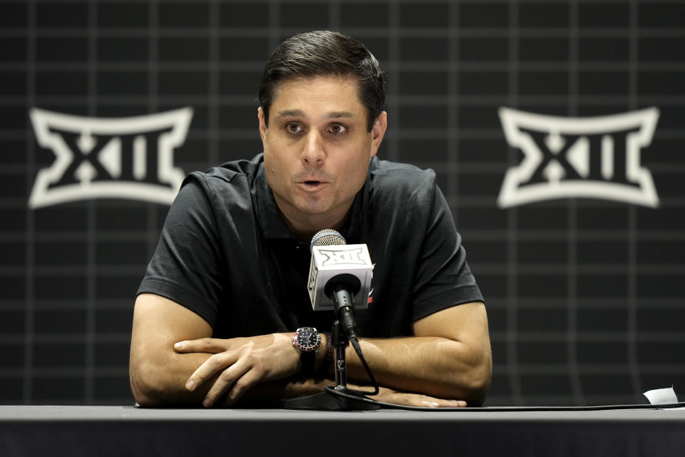Cincinnati coach Wes Miller addresses the media during the NCAA college Big 12 men's basketball media day Wednesday, Oct. 18, 2023, in Kansas City, Mo. (AP Photo/Charlie Riedel)