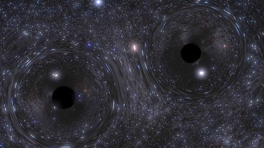  An image of two black holes in a binary pair, which could be more stable than scientists believed. 