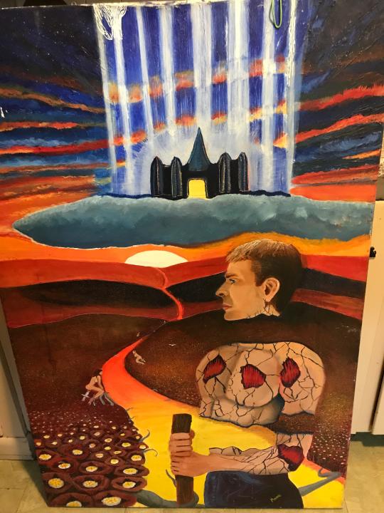 Paul Moore, who has been in recovery from addictions including opioids, cocaine and alcohol for 16 months, hopes to return to painting. Moore, 49, did this painting when he was in college getting his associates degree in art. Those are poppies on the left and the woman is riding a hypodermic needle. The yellow road represents his dream of getting out of addiction to something better, but unreachable, at the end.