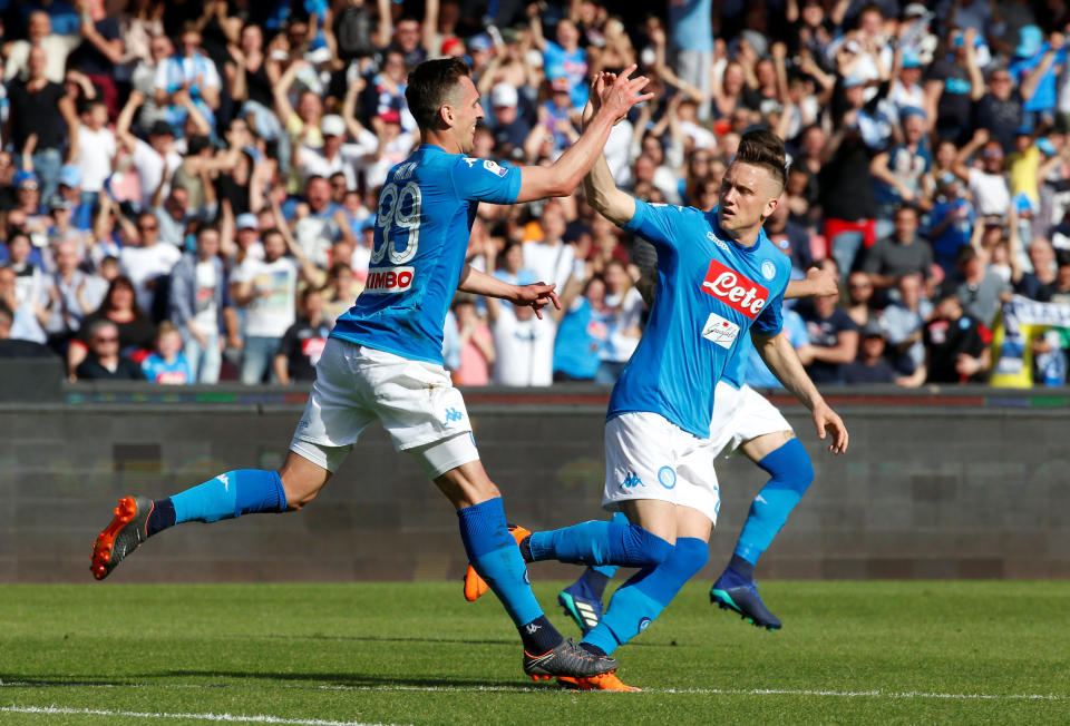 Napoli’s Arkadiusz Milik celebrates the first of two late goals against Chievo Verona. (Reuters)