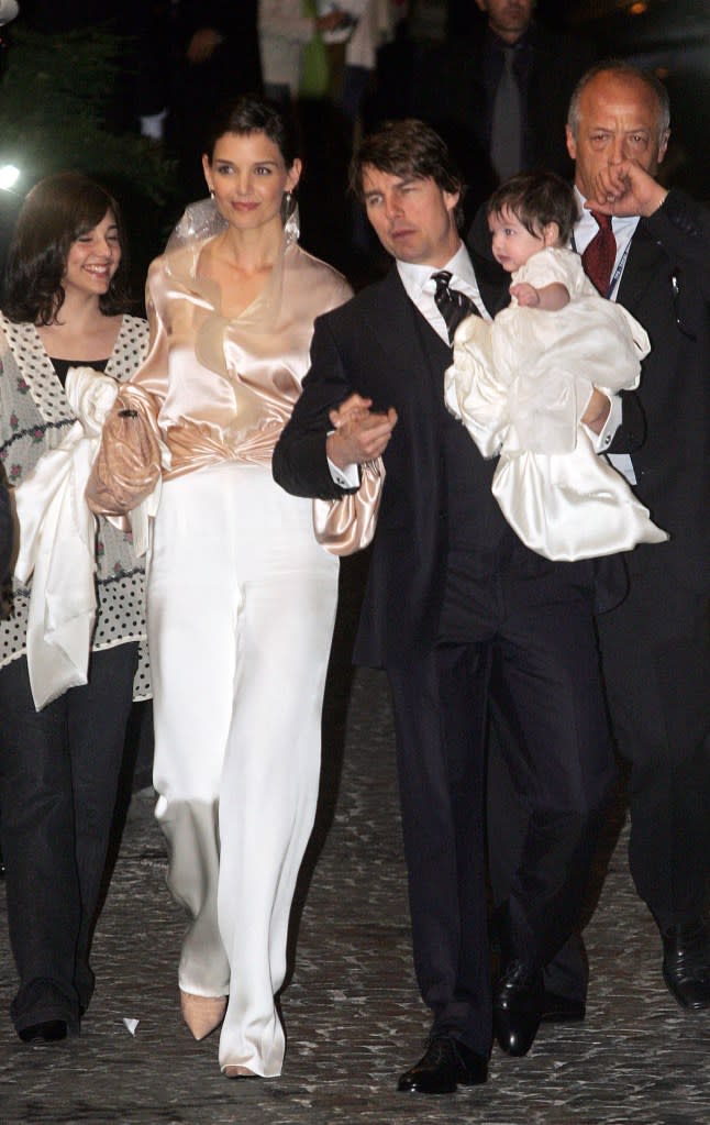 Katie Holmes and Tom Cruise with daughter Suri in Rome on November 16, 2006. AFP via Getty Images