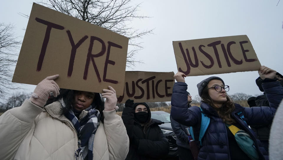 A group of demonstrators gather at dusk in Shelby Farms Park in response to the death of Tyre Nichols, who died after being beaten by Memphis police officers following a traffic stop, in Memphis, Tenn., Monday, Jan. 30, 2023. Tyre, who had a hobby in photography, frequented the park to photograph sunsets. (AP Photo/Gerald Herbert)